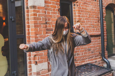 Young woman using mobile phone