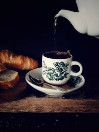 Close-up of coffee cup on table