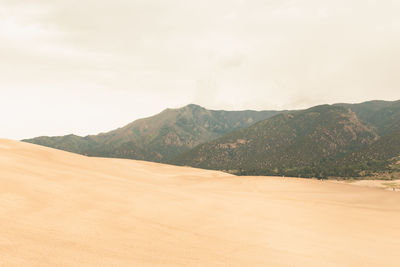 Scenic view of desert against sky