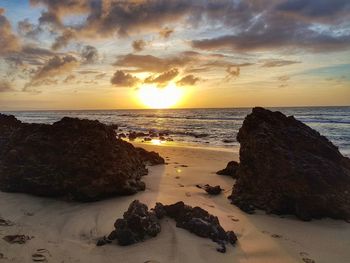 Scenic view of sea against sky during sunset