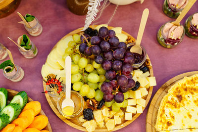 High angle view of fruits in plate on table