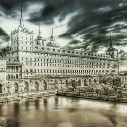 Low angle view of historical building against cloudy sky