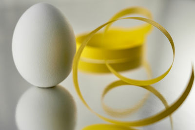 Close-up of yellow eggs on table