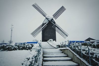 Low angle view of windmill