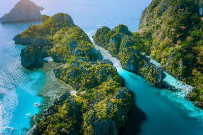 High angle view of water flowing through rocks