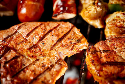 Close-up of meat on barbecue grill