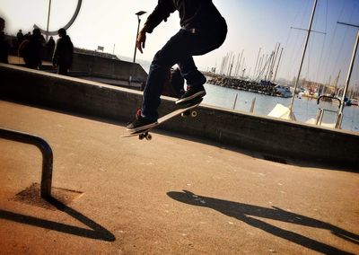 Low angle view of woman jumping