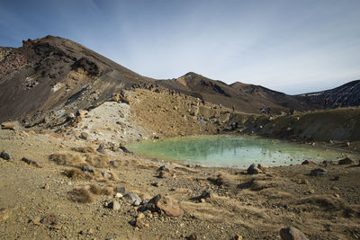 Scenic view of landscape and mountains against sky