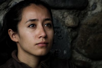 Close-up of thoughtful woman looking away