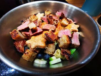 High angle view of dog food in bowl on table