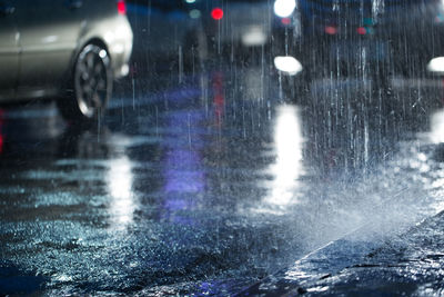 Wet street in city during rainy season