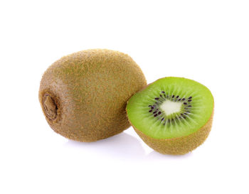 Close-up of fruits against white background