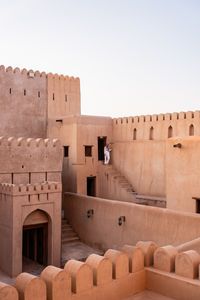 Low angle view of old ruins against clear sky