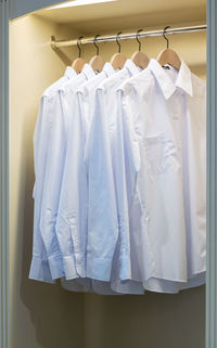 White clothes drying on rack