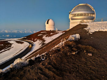 Building against clear sky during winter