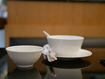 Close-up of coffee cup on table