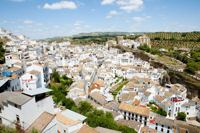 High angle shot of townscape against sky