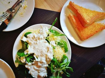 High angle view of breakfast served on table