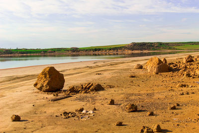 Scenic view of beach against sky