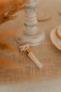 High angle view of cigarette on table