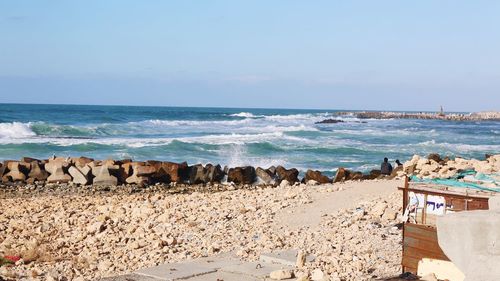 Scenic view of beach against sky