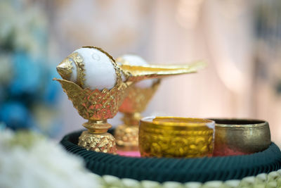 Close-up of crab in glass on table