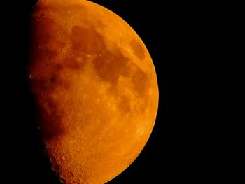 Close-up of moon over black background