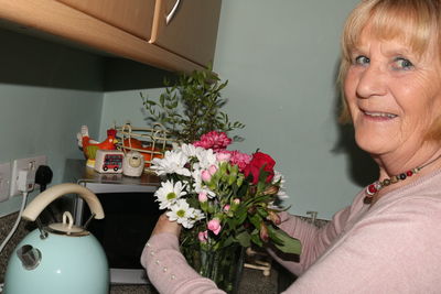 Portrait of woman with flowers