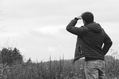 Woman standing on field