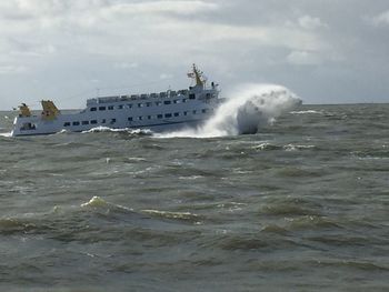 View of waves splashing in sea