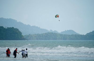 People enjoying in calm sea