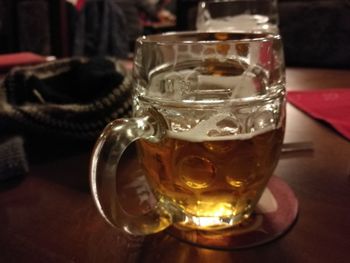 Close-up of beer in glass on table