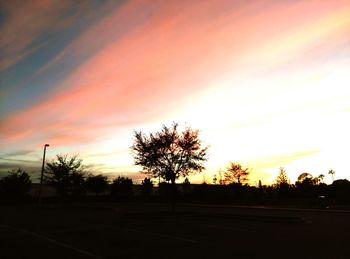 Scenic view of landscape at sunset