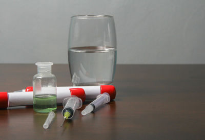 Close-up of glasses on table