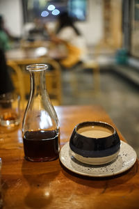 Close-up of beer glass on table in restaurant