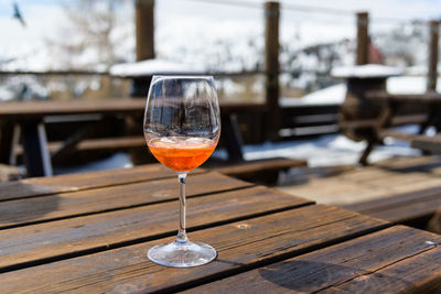 Close-up of wineglass on table