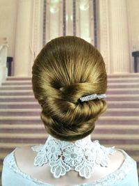 Rear view of woman wearing hat