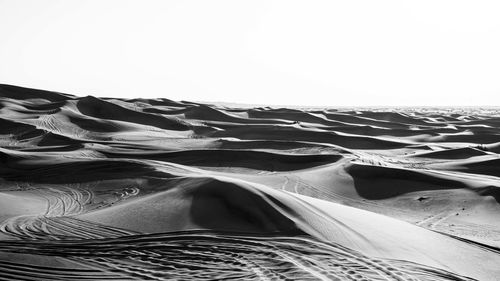 Scenic view of desert against clear sky