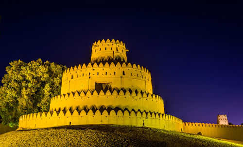 Low angle view of built structure against blue sky