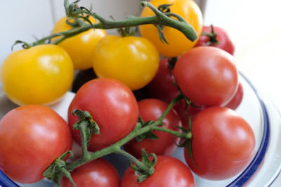 Close-up of cherry tomatoes in container