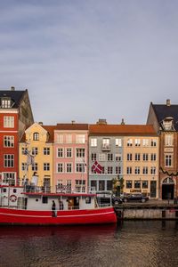 Boats moored in canal