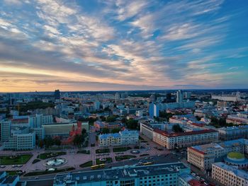 High angle view of buildings against sky during sunset