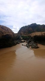 Scenic view of beach against sky