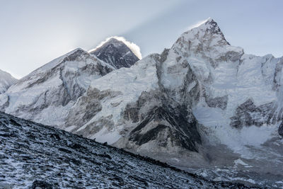 Scenic view of snowcapped mountains against sky