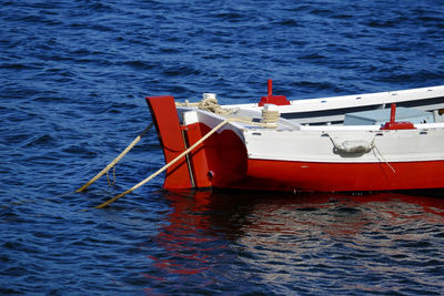 Close-up of red boat in sea