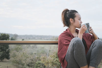 Series photo of young woman hand holding ceramic mug, positive emotion, chill and joyful