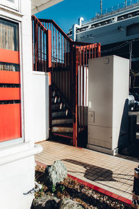 Exterior of buildings in city red wall