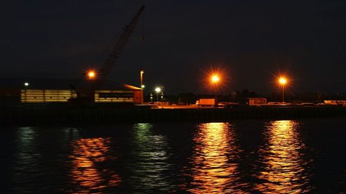 Reflection of illuminated buildings in water