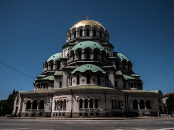 Low angle view of building against blue sky