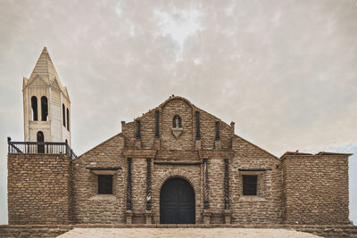 Low angle view of historical building against sky